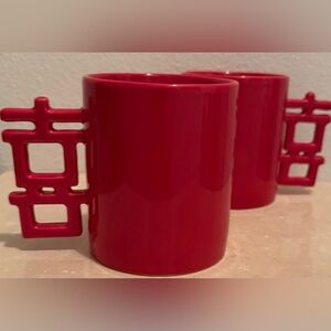 2 CiChi red ceramic mugsw/the Chinese "Double Happiness" (囍) character handles.